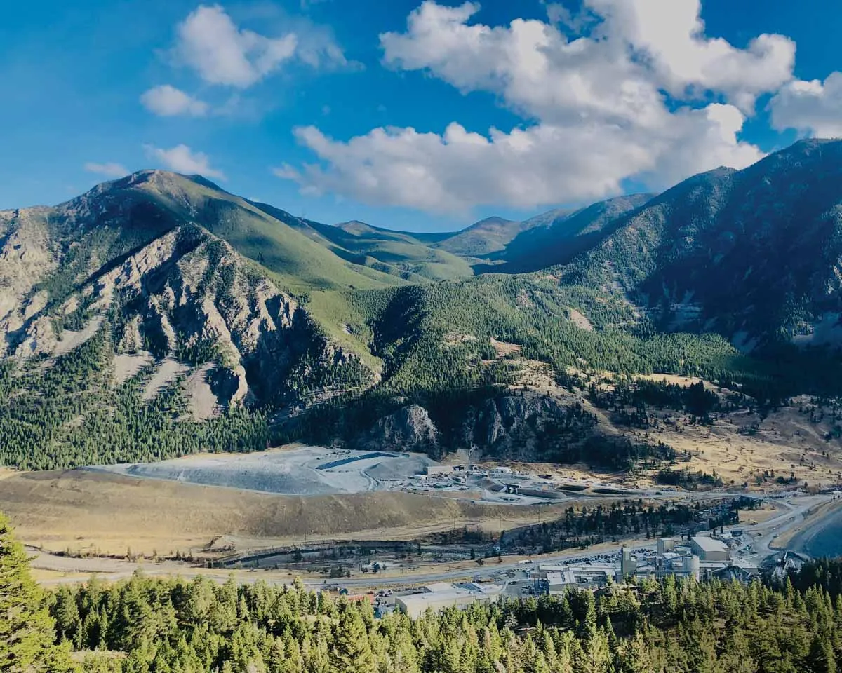 Stillwater mine facilities in a forested mountain valley